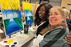 Antoinette-Cave-and-Linda-Dolin-w-artwork