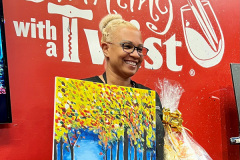 Dr-Thelma-Tennie-and-her-1st-place-art-work
